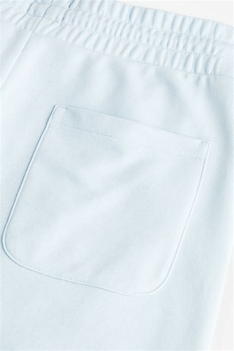 Regular Fit Sweatshorts - Light blue - Men | H&M IN