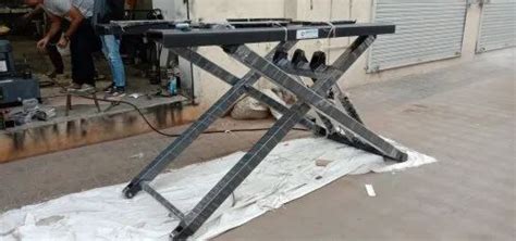 Hydraulic Washing Lift - 4 Ton Hydraulic Car Washing Lift from Ahmedabad