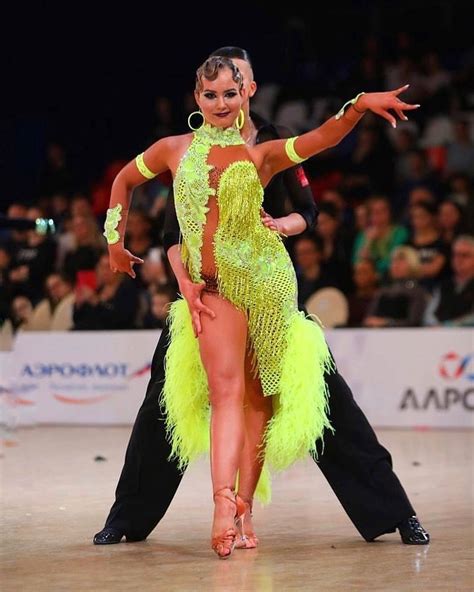Latin dress with feathers, arm bands and bracelets | Ballroom costumes ...