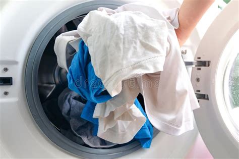 Woman S Hand Pick Up Clothes Washing Machine. Clean and Healthy ...