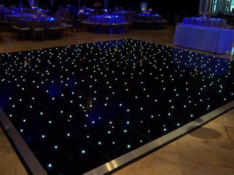 Black starlight dance floor by Wizard Connection. | Dance floor wedding ...