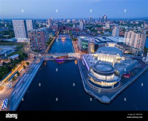 Aerial view of The Lowry Centre at Salford Quays with Manchester in ...
