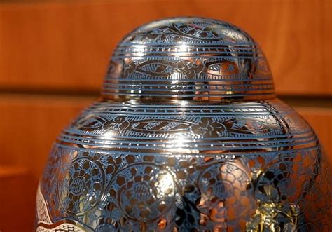 Funeral home directors care for the living by working with the dead ...