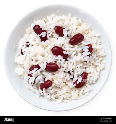 Cooked white rice with red kidney beans in a white ceramic bowl ...