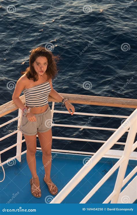 Asian Teen Standing on Blue Deck of Ferry Boat on the Way To Lesvos in ...