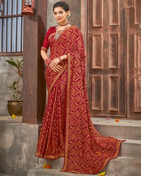 Vishal Prints Dark Red Brasso Saree With Foil Print And Zari Border