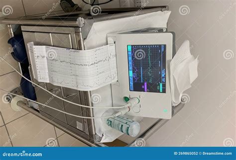 Electronic Fetal Monitor EFM Recording The Fetal Heartbeat On The Monitor And Typing Cardiogram ...