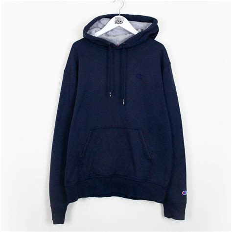 Champion Navy Blue Pullover Hoodie... - Depop
