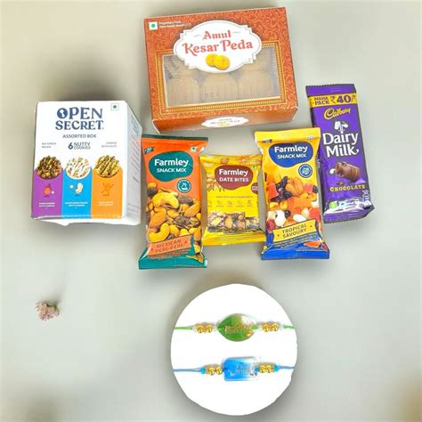 Send Rakhi Delightful Sweets and Treats Pack Online