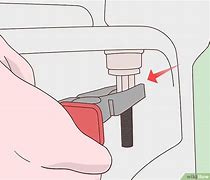 Image result for How to Unlock a Toilet Seat
