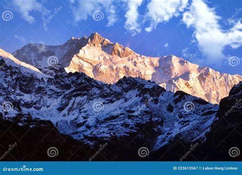 Early Morning Sun Touches Kanchenjunga Summit As Seen from Dzongri Top. Stock Image - Image of ...