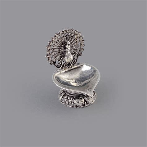 Divine Peacock Deepam in Silver - Exclusive Collection! – Krishna ...