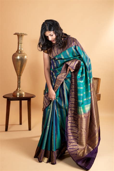 Peacock blue turning silk saree – Priyangaa