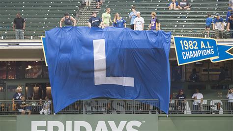The story behind the giant 'L' flag at Tuesday's Brewers game