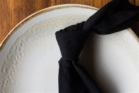 Sleek Black Linen Napkin Rentals in Ibiza: Nighttime Elegance by The Boss!