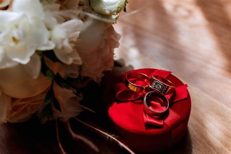 A red box with three rings inside of it | Premium Photo