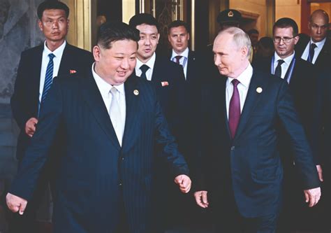 Putin meets North Korea’s Kim in Beijing