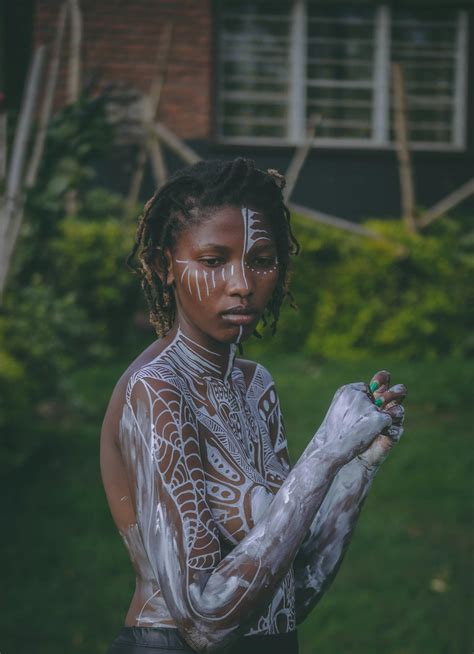 Woman in Traditional Body Painting · Free Stock Photo