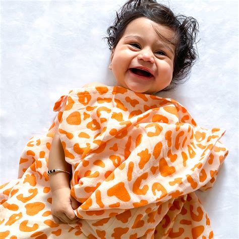 Shop and Keep Your Baby Cozy with Yellow Doodle Organic Muslin Swaddles ...