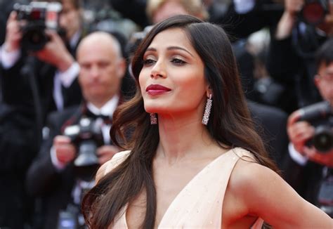 PIX: Freida Pinto's glamorous turn at Cannes 2014 red carpet - Rediff ...