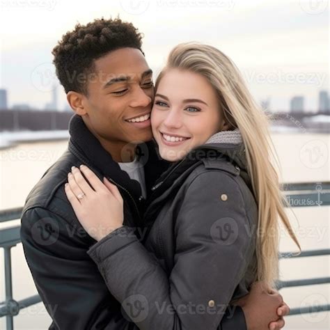 Loving teenage interracial couple is enjoying a romantic winter day AI ...