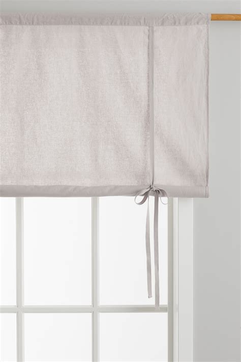 Light greige Linen-blend roll-up curtain at H&M Home | H&M IN