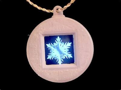 Frozen-Inspired Animated Pendant with Temperature Sensing