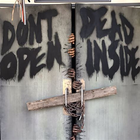 Remember: Don't dead. Open inside. #TWD at the @AMC_TV Fan Hub. #SDCC ...