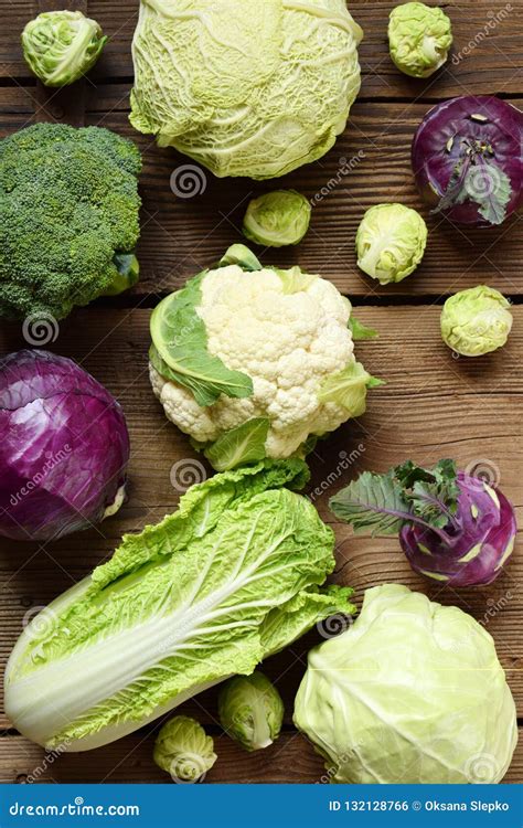 Different Varieties of Cabbages on Wooden Background. Organic Fresh ...