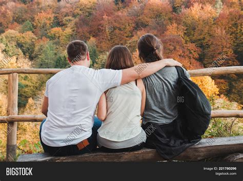 One Guy Hugs Two Girls Image & Photo (Free Trial) | Bigstock