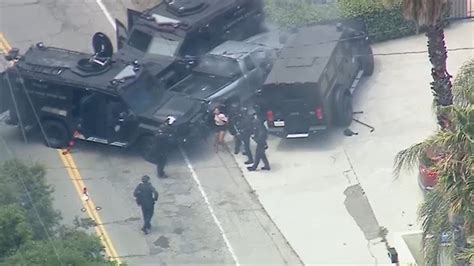 https://media.deepnewz.com/images/woman-arrested-after-hit-run-leads-to-swat-standoff-tear-gas-use-studio-city-0e2f1037/37e47ee32d76ba19ae8a9dafb0db916a74dcf620beb8afb70f5e867b31f7f525.jpeg