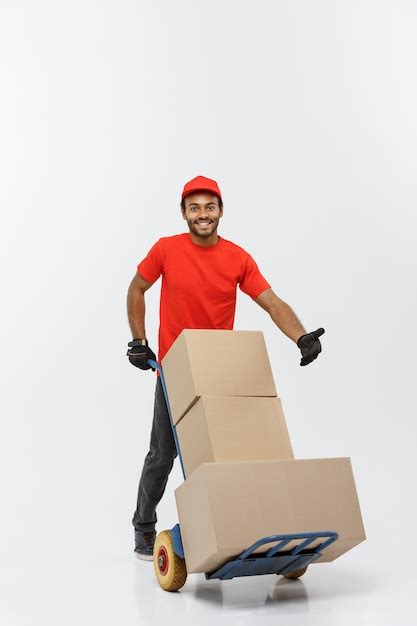 Delivery concept - portrait of handsome african american delivery man ...