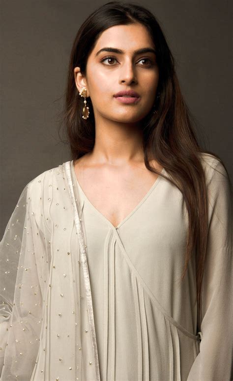 This angrakha in steel grey is highlighted with vertical pin-tucks all ...