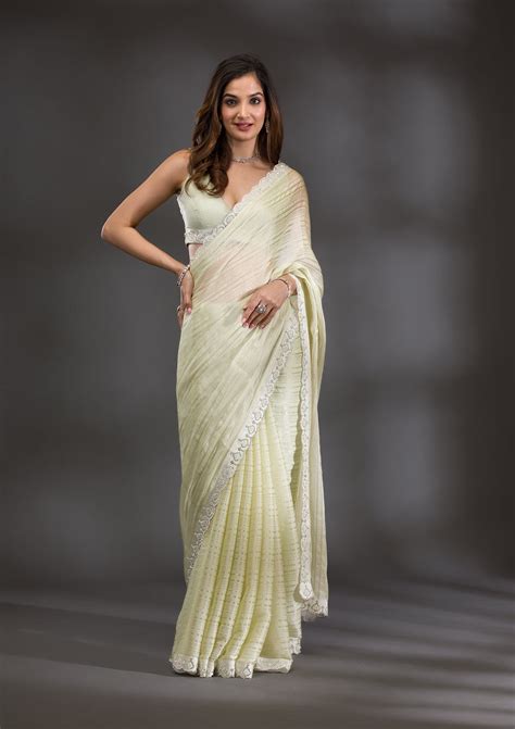 Buy Pista Green Swarovski Georgette Saree - Koskii