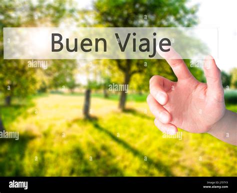 Buen Viaje (Good Trip in Spanish) - Hand pressing a button on blurred ...