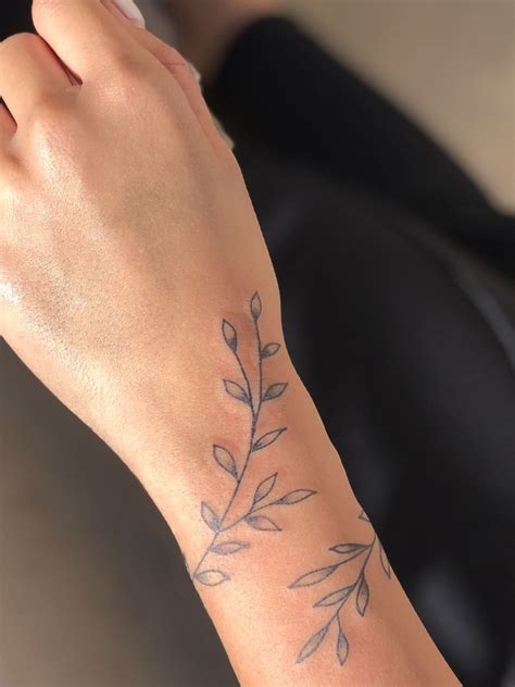 dainty arm tattoos for women