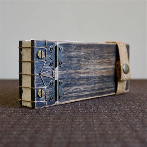 I make wooden books. A solid oak Japanese stab binding inspired by ...