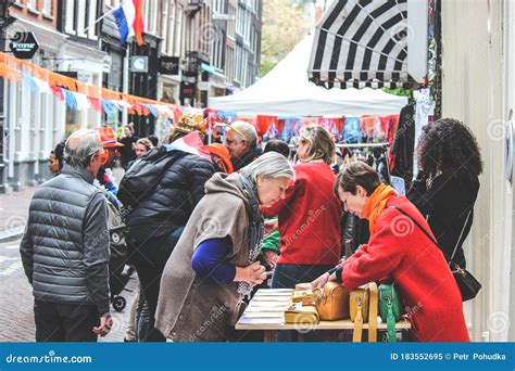 Amsterdam, Netherlands - April 27, 2019: People Buying and Selling on ...