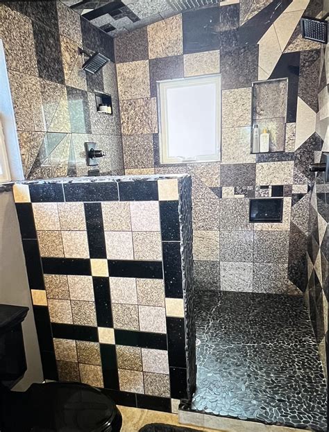 Remove and replace shower river rock tile flooring and marble wall tile ...
