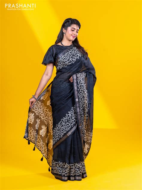 Semi crepe saree black with allover self emboss and batik printed bord ...
