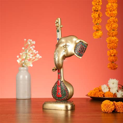 Buy Brass Superfine Lord Ganesha with Sitar/Veena Table Accent ...