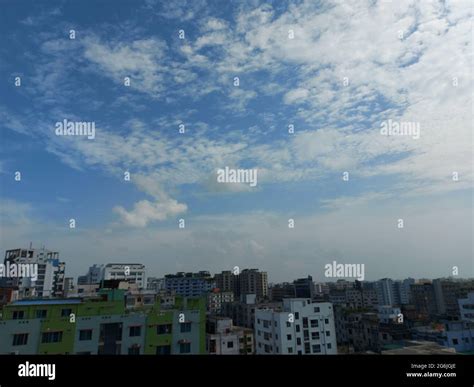 Bangladesh capital Dhaka city landscape on a sunny morning. Blue sky ...