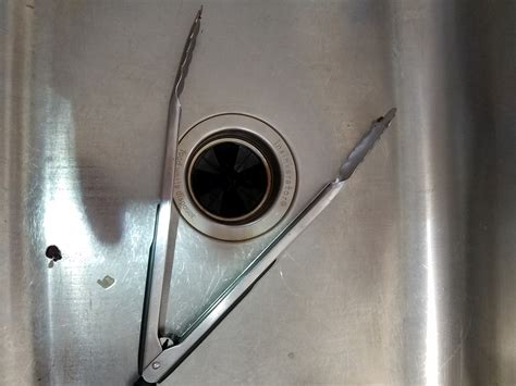 How to Fix Garbage Disposal 的图像结果