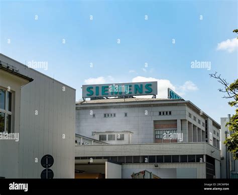 Siemens logo on top of the building. German conglomerate corporation ...