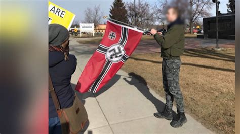 Man interrupts Kalispell protest with Nazi flag