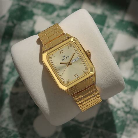 Buy Online Titan Quartz Analog with Day and Date Champagne Dial ...