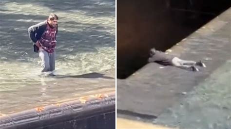 Video: Man jumps into 9/11 Memorial pool in New York City, injures ...