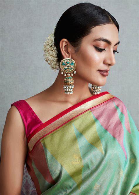 Ira: Banarasi Silk Tissue Saree In The Shades Of Blue And Pink – Zari ...