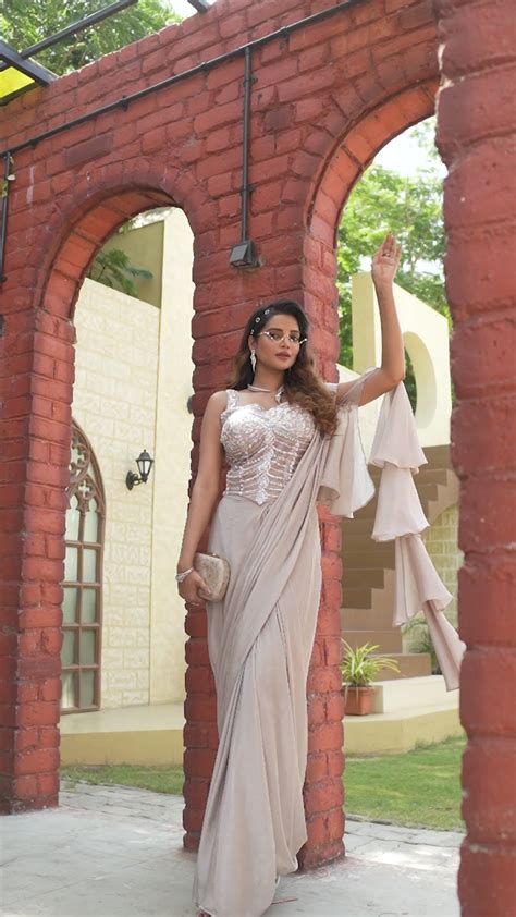 Corset Style Pre-Draped Saree with Floral Pearl Embellshed Bustier and ...