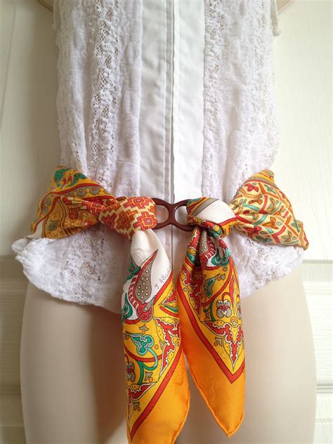 Wearing H scarf as a belt | Scarf storage, Hermes scarf, Scarf styles